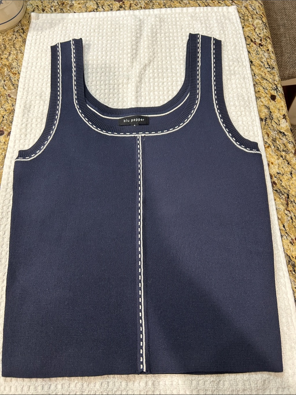 Ladies size small navy tank with white trim